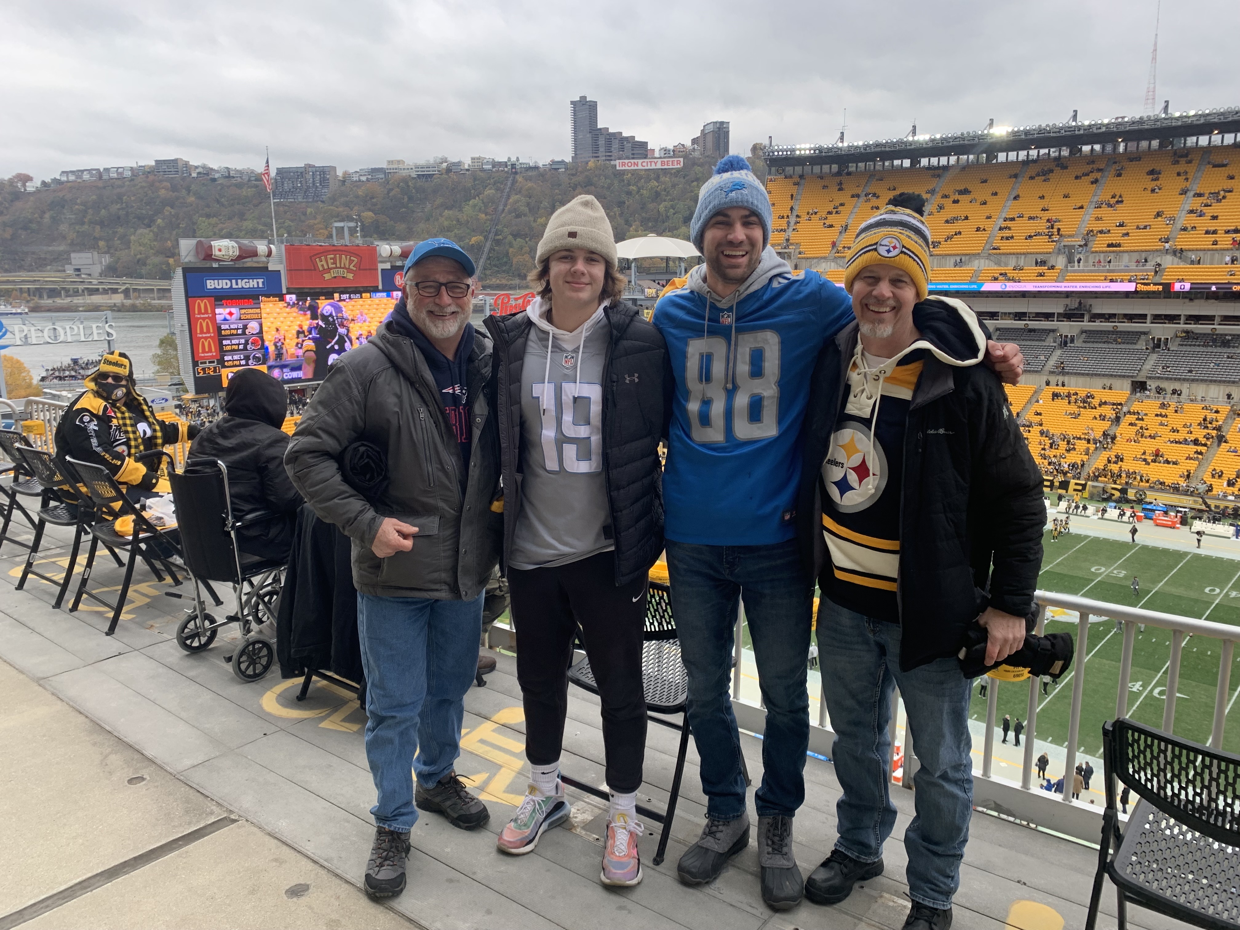 Luke Warner at a football game with family and friends.